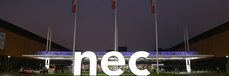 NEC Exterior Piazza Nightime 745x250